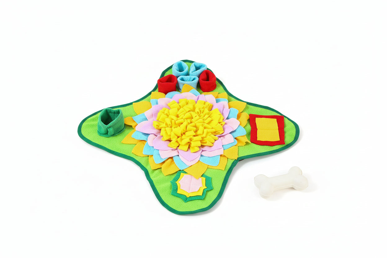 Dog sitting next to a colorful dog puzzle mat on a table. from shop ThinkyPets