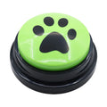 Green button with a black paw print on a white background