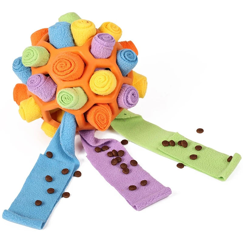Colorful dog toy with soft rolls and chewable treats on a white background  on the shop ThinkyPets