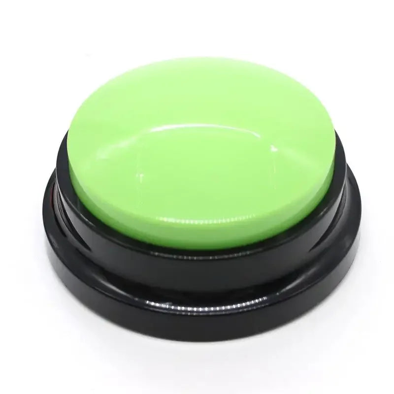 Green button with black base on a white background