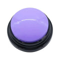 Round purple object with black base on a white background