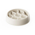 White ceramic bowl with a textured interior on a white background