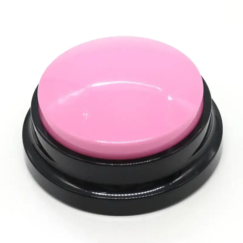 Pink button with black base on a white background