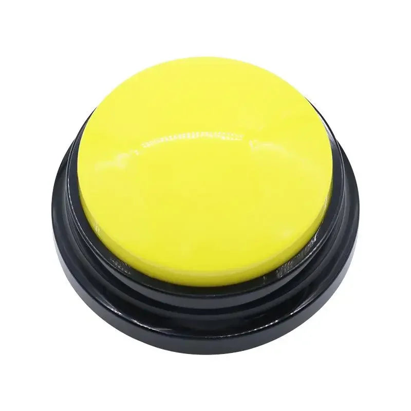 Yellow button with black base on a white background