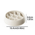 White silicone mold with textured design on a white background
