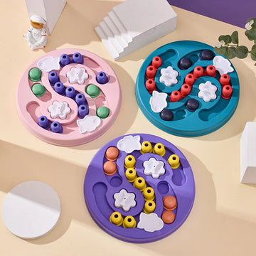 Three colorful puzzle toys on a beige surface with a purple background sold by ThinkyPets online store