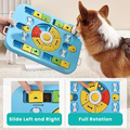 Dog interacting with a colorful puzzle toy on a carpeted floor.