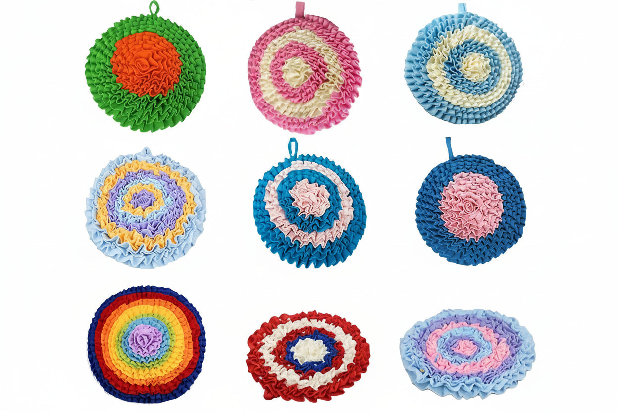 Colorful crocheted sniffle mats sold by thinkypets