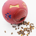 Pink red pet toy with a lid, surrounded by pet food on a white background sold by thinkypets