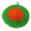 Green and orange textured sniffle mat on a light white background sold by thinkypets