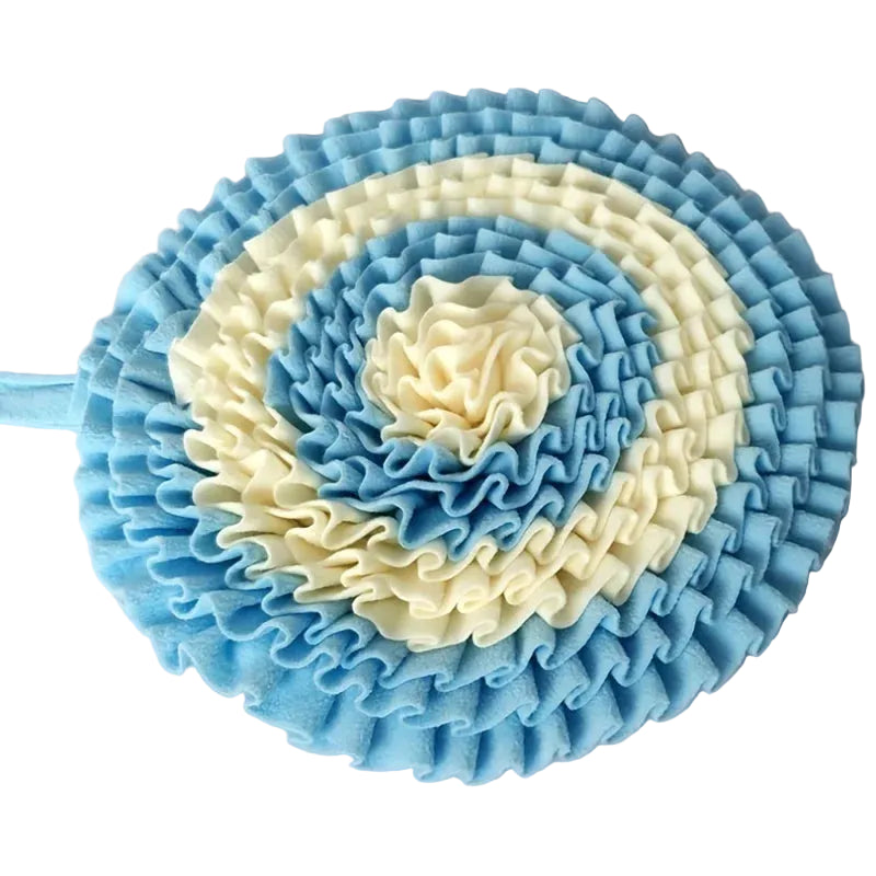 Blue and white ruffled flower headband on a light gray background