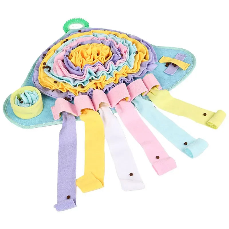 Colorful dog toy with ruffles and ribbons on a white background