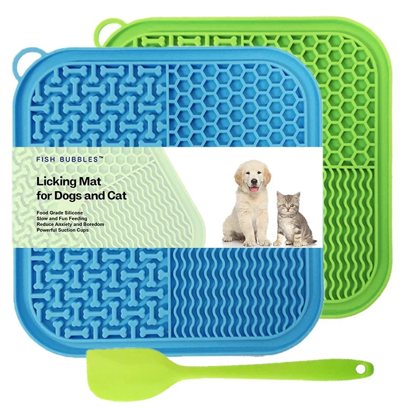 Gray silicone licking mat for dogs with textured patterns and a green spatula on a white background from ThinkyPets