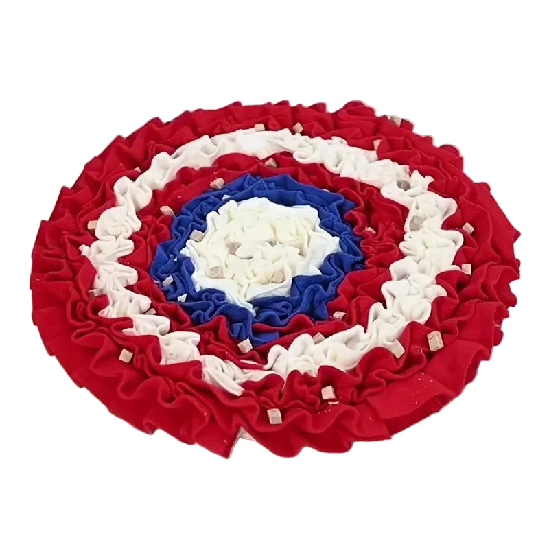 Round decorative sniffle mat with red, white, and blue concentric circle pattern on a white background sold by thinkypets