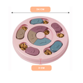 Pink pet puzzle toy with compartments filled with treats, showing dimensions on a white background sold by ThinkyPets