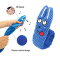 Blue toy with a face, held by a hand, on a white background from shop ThinkyPets